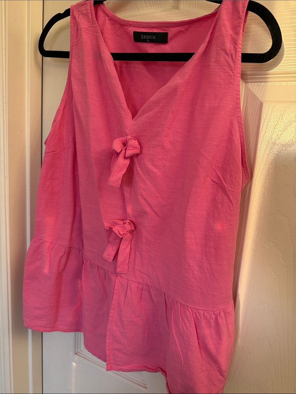 Zesica Pink Sleeveless Tie-Front Peplum Top
